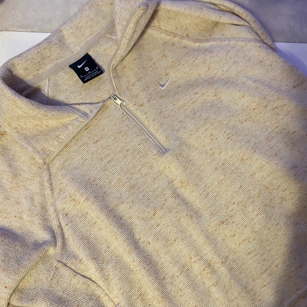 Cream color Nike quarter zip sweater